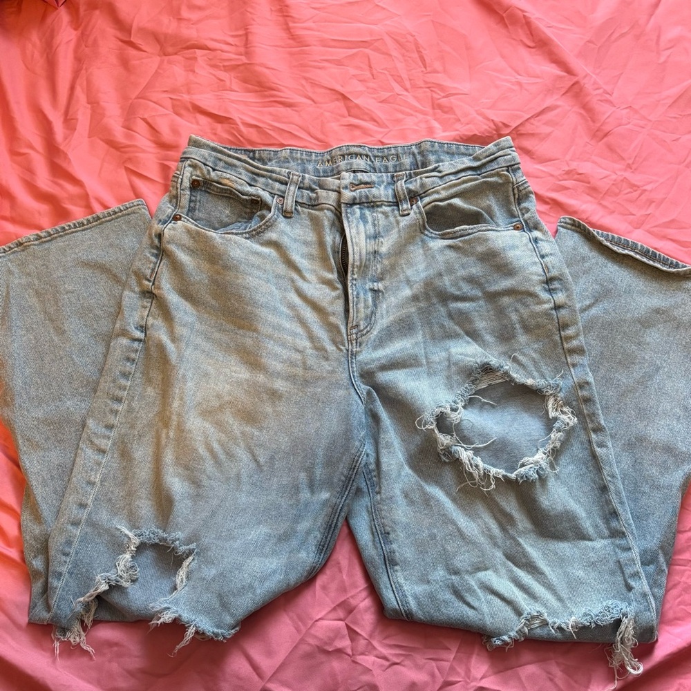 American Eagle Outfitters Light Blue Distressed Denim with Brown Patch
